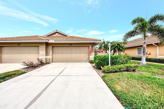 view of front of home with a garage