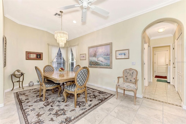 tiled dining area with crown molding and ceiling fan with notable chandelier