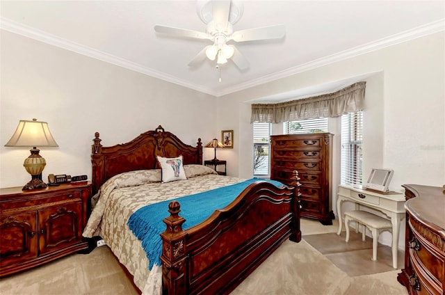 carpeted bedroom with crown molding and ceiling fan