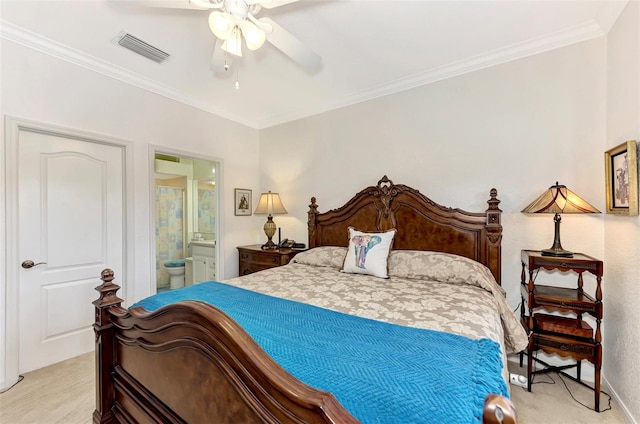 bedroom with crown molding, connected bathroom, light colored carpet, and ceiling fan