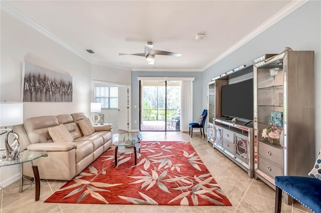 living room with crown molding, light tile flooring, and ceiling fan