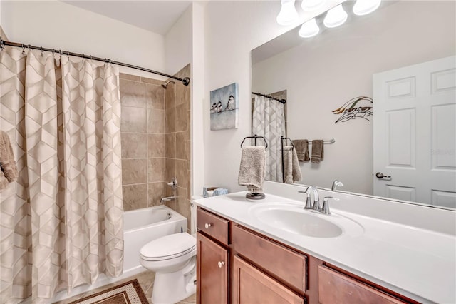 full bathroom with tile floors, shower / bath combination with curtain, toilet, and vanity