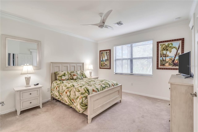 carpeted bedroom with crown molding and ceiling fan