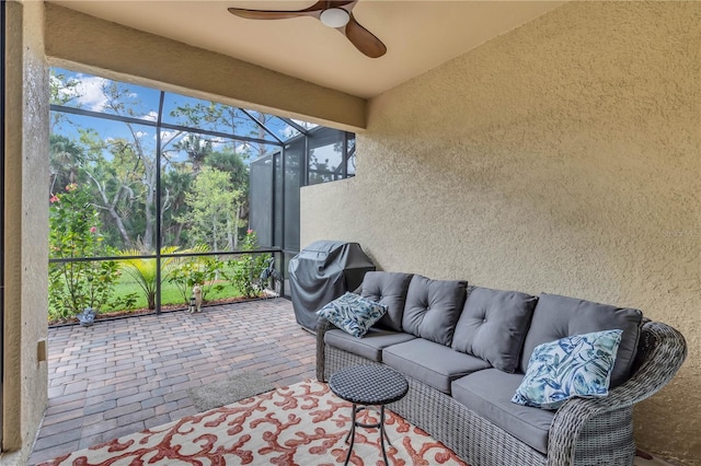 sunroom / solarium with ceiling fan