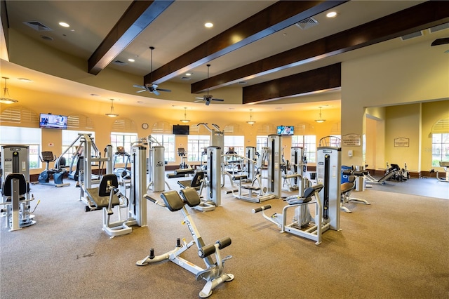 gym with light carpet and ceiling fan