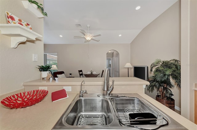 kitchen with ceiling fan and sink