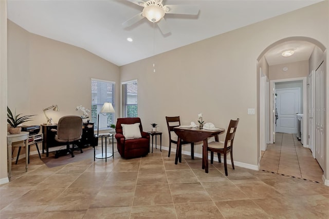 sitting room featuring light tile floors, lofted ceiling, and ceiling fan