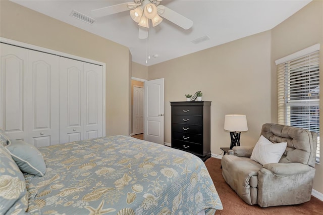 bedroom featuring carpet floors, a closet, and ceiling fan