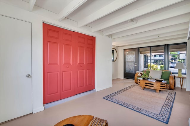 entrance foyer with beam ceiling