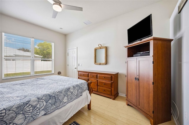 bedroom featuring ceiling fan and light wood-type flooring