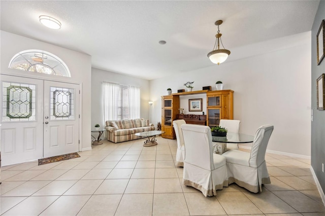 dining room with light tile flooring