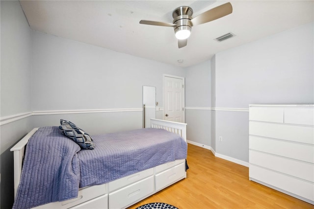 bedroom featuring ceiling fan and light wood-type flooring