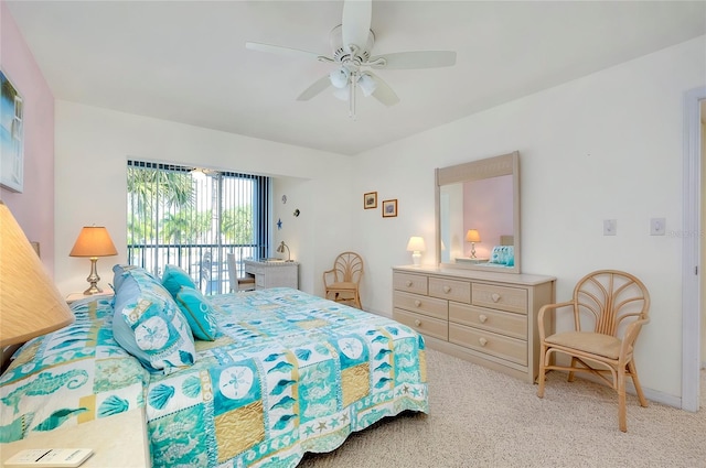 bedroom with light carpet and ceiling fan