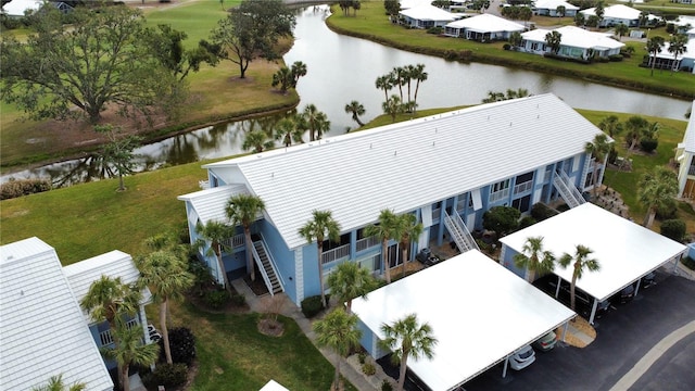 birds eye view of property featuring a water view