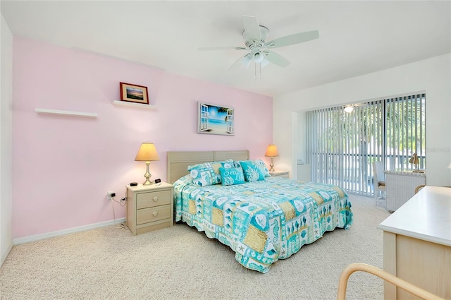 bedroom featuring baseboards, carpet floors, a ceiling fan, and access to exterior