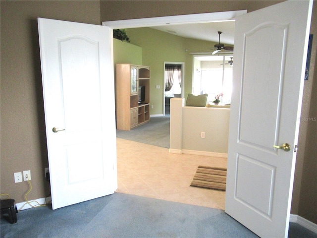 hallway with light tile flooring