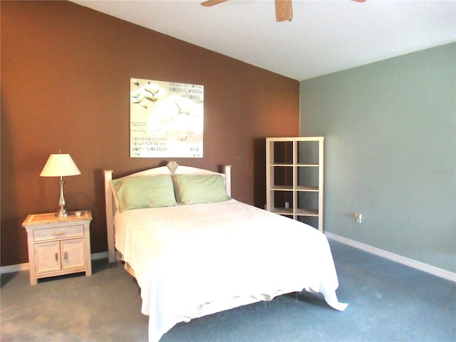 carpeted bedroom with vaulted ceiling and ceiling fan