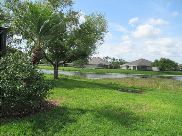 view of yard with a water view