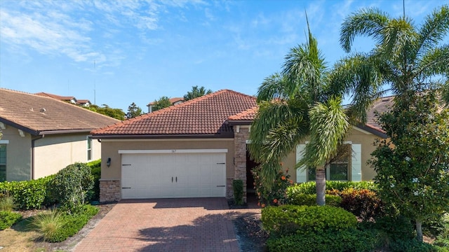 view of front of property featuring a garage