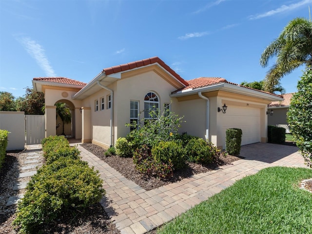 205 Mestre Pl, North Venice, FL 34275 - mediterranean / spanish home with a garage