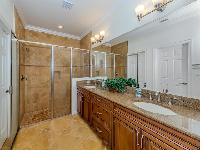 bathroom with an enclosed shower, double sink vanity, tile floors, and ornamental molding