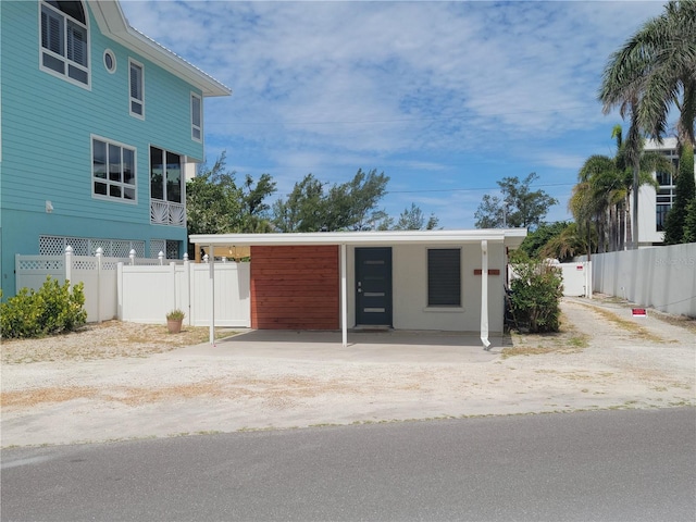 view of front of house featuring a carport