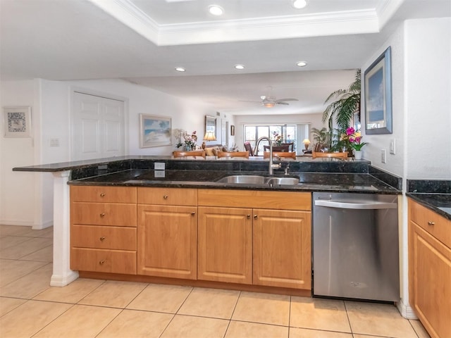 kitchen with dark stone counters, sink, stainless steel dishwasher, ceiling fan, and light tile patterned flooring