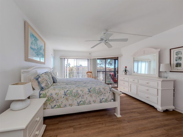 bedroom with ceiling fan and dark hardwood / wood-style flooring