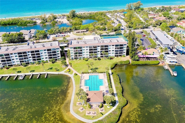 birds eye view of property featuring a water view