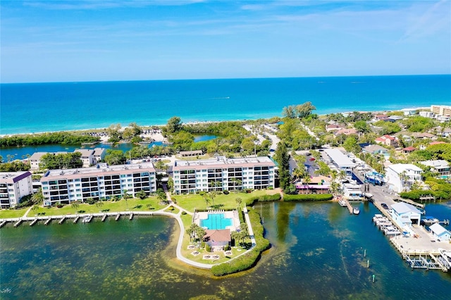 bird's eye view with a water view