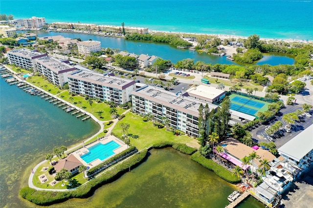 birds eye view of property featuring a water view