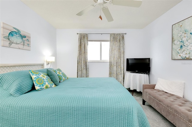 bedroom with ceiling fan and carpet floors