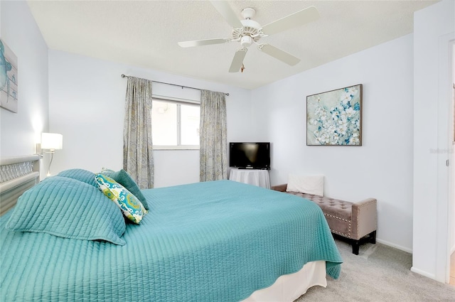 bedroom with light carpet and ceiling fan