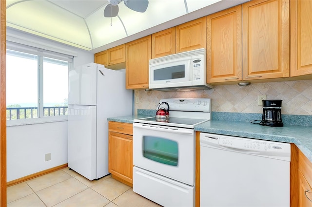 kitchen with backsplash, white appliances, light tile flooring, and ceiling fan