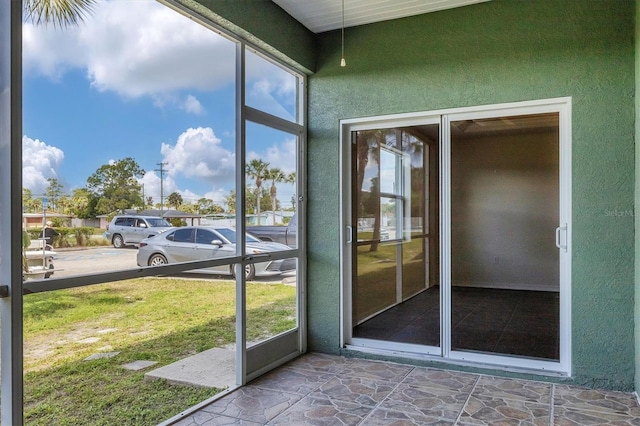 view of unfurnished sunroom