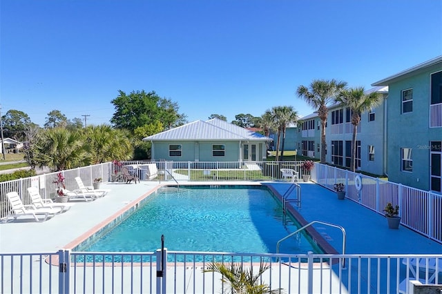 view of swimming pool featuring a patio