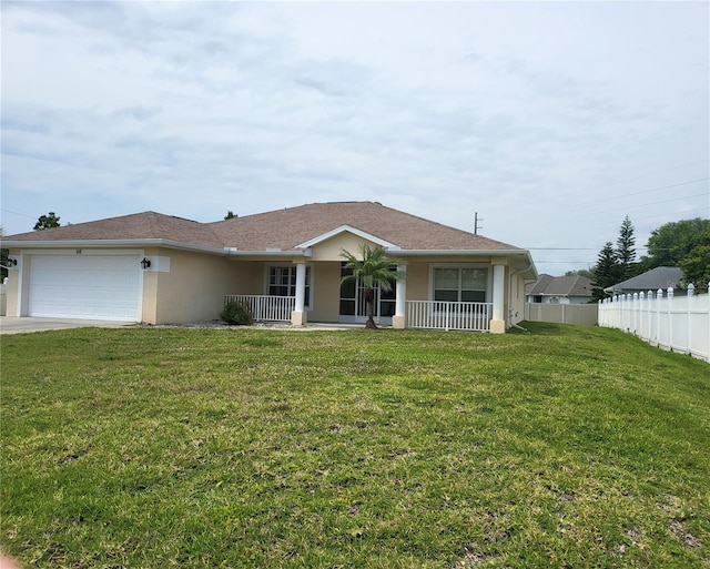 ranch-style house featuring a porch, a front yard, and a garage