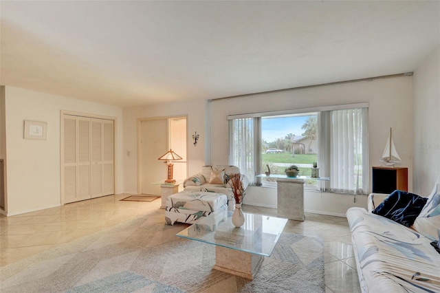 living room with light tile patterned floors