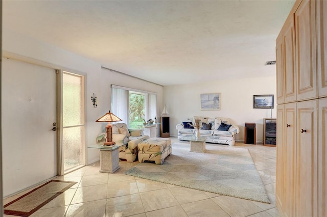 tiled living room with beverage cooler