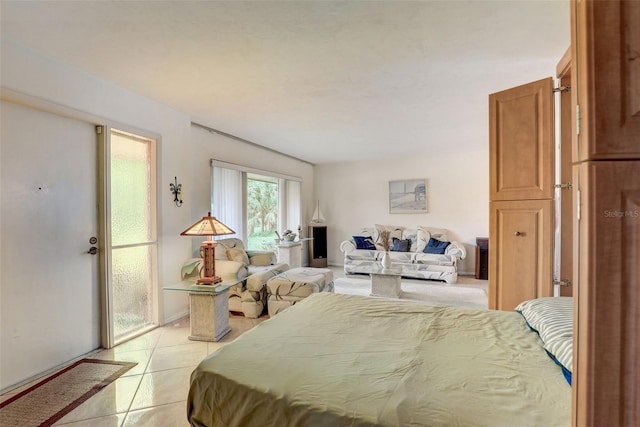 bedroom with light tile patterned floors