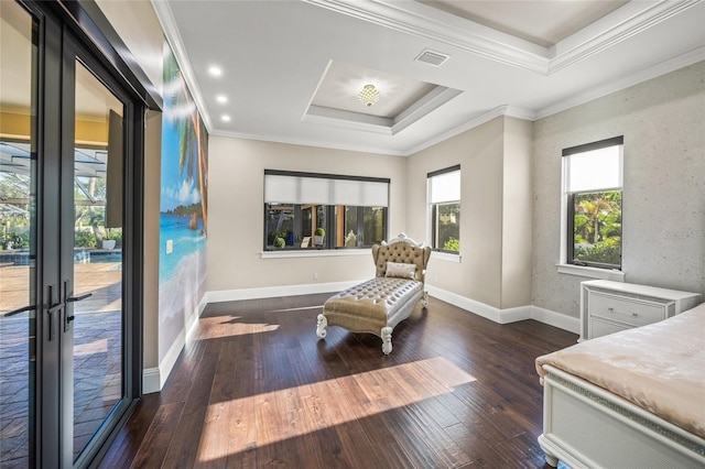 bedroom featuring french doors, a raised ceiling, dark hardwood / wood-style floors, crown molding, and access to outside