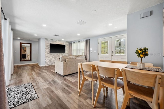 dining room with light hardwood / wood-style flooring