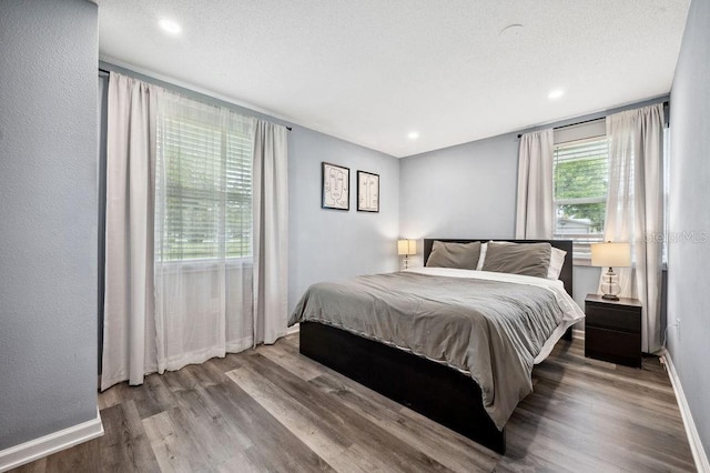 bedroom featuring wood-type flooring