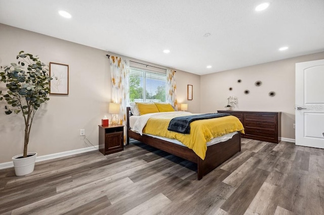 bedroom featuring hardwood / wood-style floors