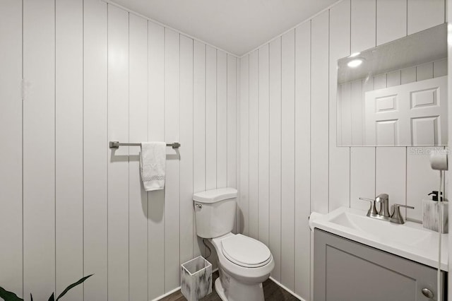 bathroom with oversized vanity and toilet