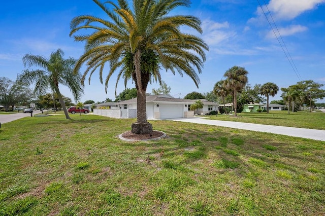 view of yard with a garage