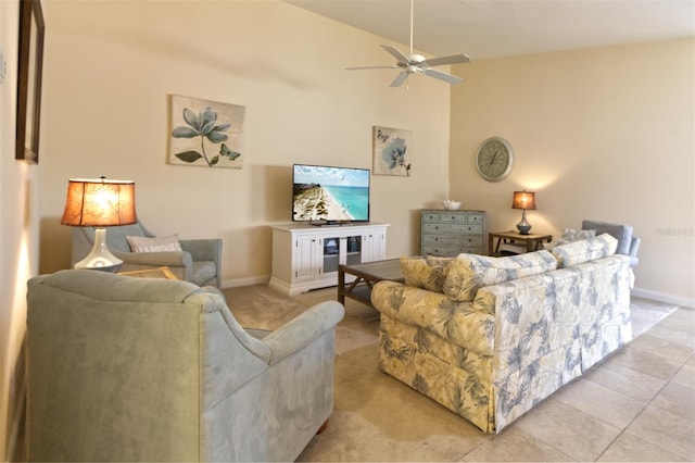 tiled living room with high vaulted ceiling and ceiling fan