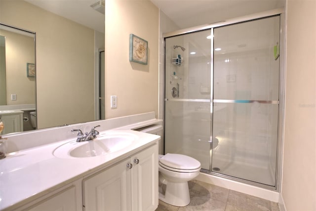 bathroom with vanity, toilet, an enclosed shower, and tile patterned flooring