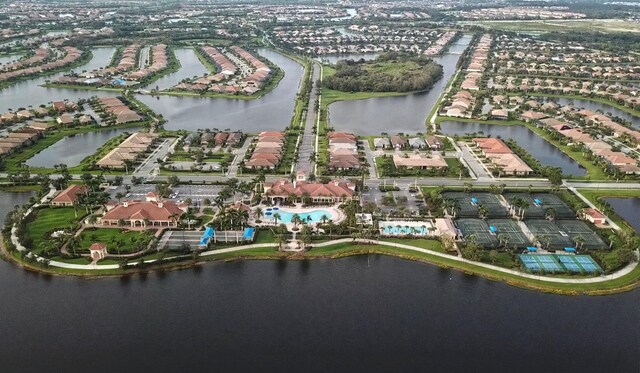 bird's eye view with a water view