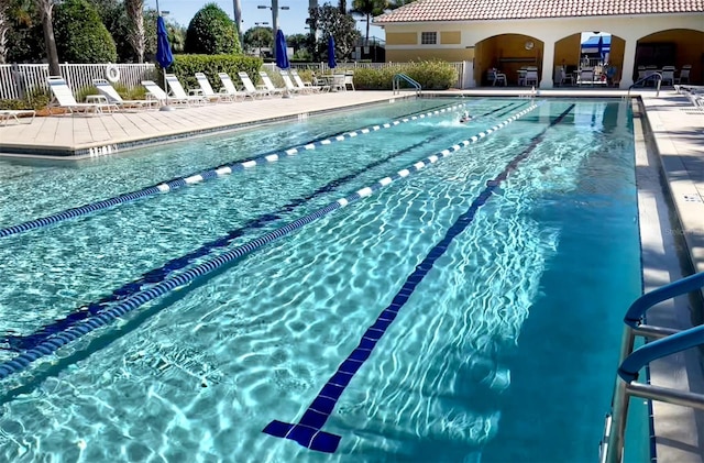 view of swimming pool with a patio area